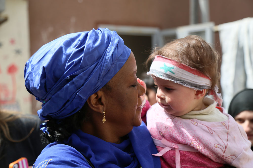 Ms. Bangura with one-year-old Maysa’a during her visit to Syria. Photo: Hussam Al Saleh