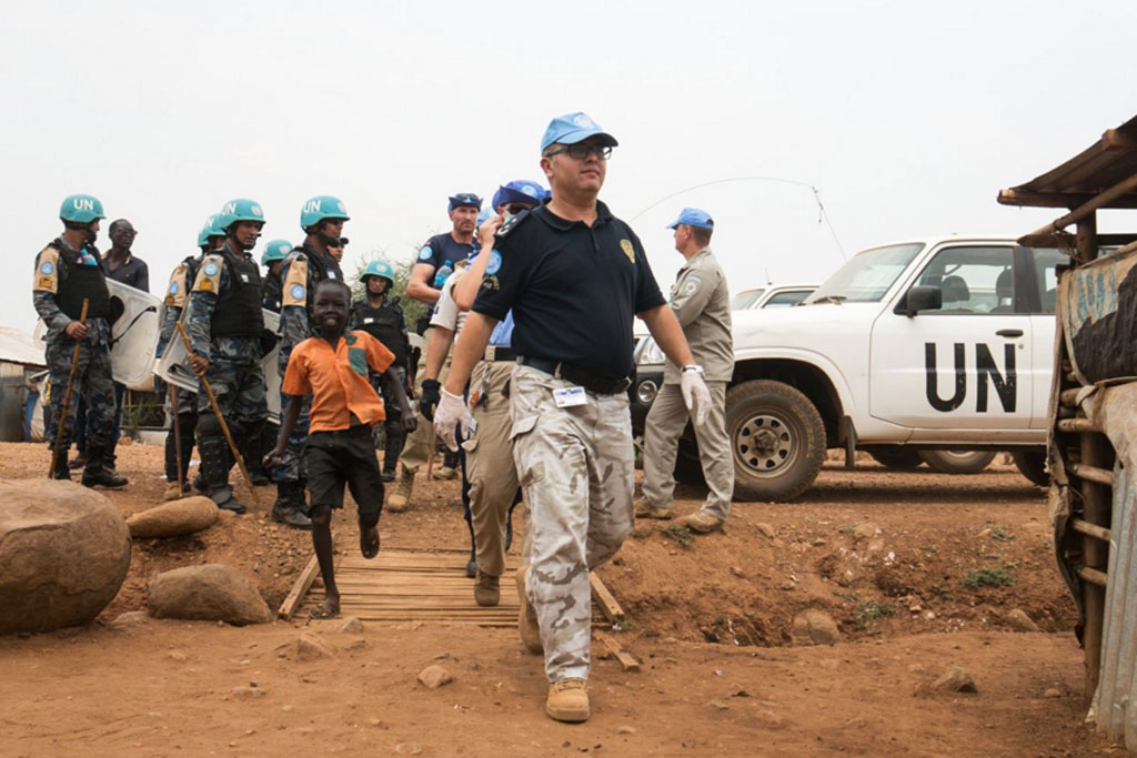 UN Police conducts search operation in Juba Protection of Civilians site, South Sudan. Photo: UNMISS