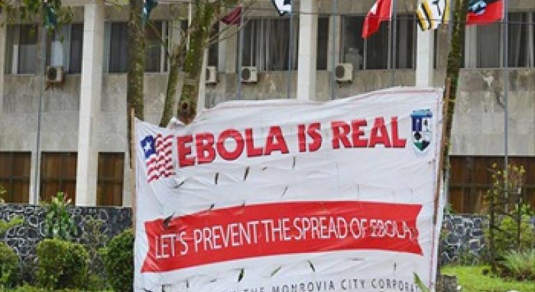 A sign outside the Monrovia City Corporation in Liberia aims at preventing the spread of Ebola.