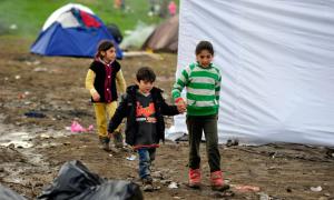 Refugee children on the border of the former Yugoslav Republic of Macedonia and Serbia.