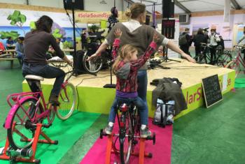 Power station at COP21 where participants don’t just charge their cell phones, drink juices, or listen to music—they cycle for them.