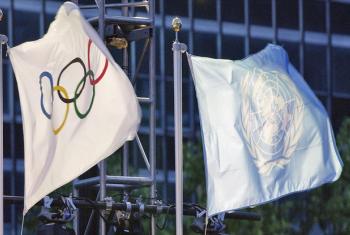 The United Nations and the Olympic flags.
