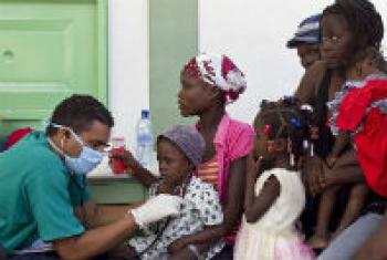Patients with cholera are treated by a doctor at the hospital in L'Estere, Haiti.