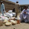 Distribuição de ajuda alimentar a deslocados no Afeganistão. Foto: Acnur