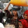 Meninas buscando água no distrito de Mawyah, Taiz, Iêmen. Foto: Ocha