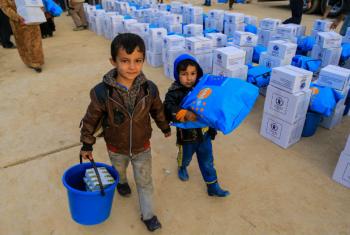 Durante os últimos 100 dias, agências humanitárias conseguiram entregar comida para 600 mil iraquianos. Foto: Unicef/Khuzaie