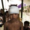 Mohammed Yasin mwenye umri wa miaka 8, ni miongoni mwa watoto waRohingya wanaohifadhiwa katika kambi ya wakimbizi huko Bazar ya Cox. Picha: © UNICEF / UN0135698 / Brown